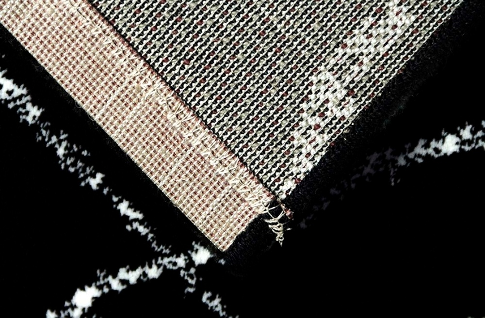 kusový koberec Osta INK 463 011/AF900 černo-bílý